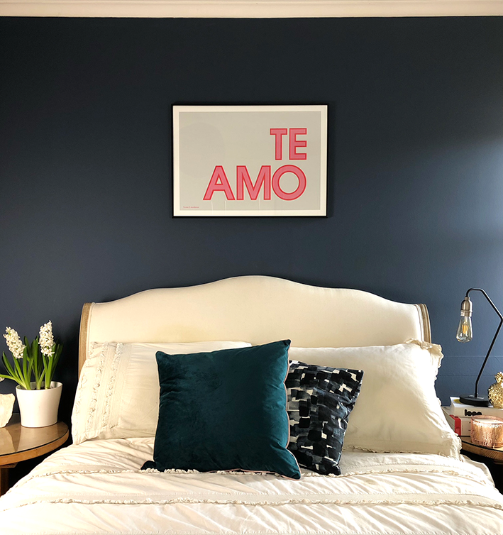 My bedroom wall, stiffkey blue from F&B and our 'Te amo' print