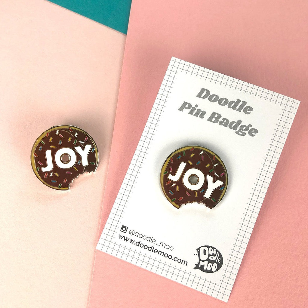 JOY Doughnut enamel pin designed by Doodlemoo