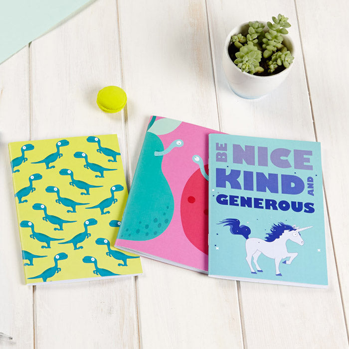 Dinosaur, apple and pear and unicorn notebooks