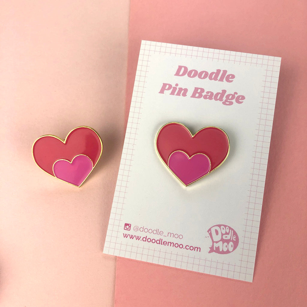 Heart Enamel Pin in pink designed by Doodlemoo
