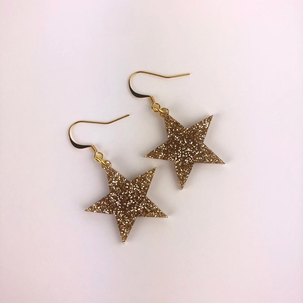 Star earrings made of glitter gold acrylic